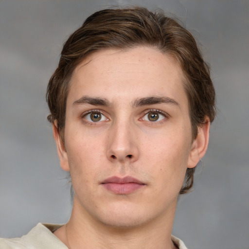 Neutral white young-adult male with medium  brown hair and grey eyes