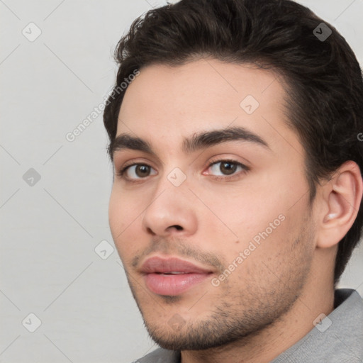 Neutral white young-adult male with short  brown hair and brown eyes