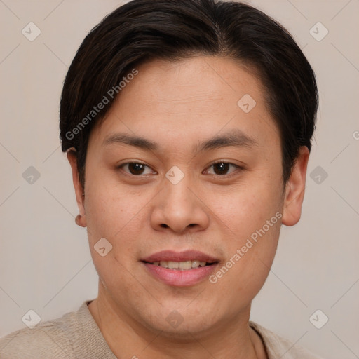 Joyful asian young-adult female with short  brown hair and brown eyes