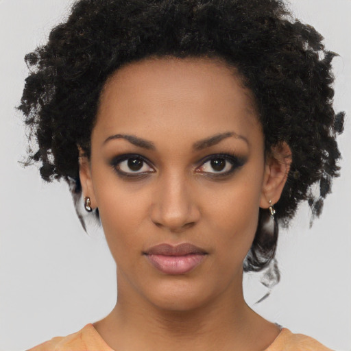 Neutral black young-adult female with short  black hair and brown eyes