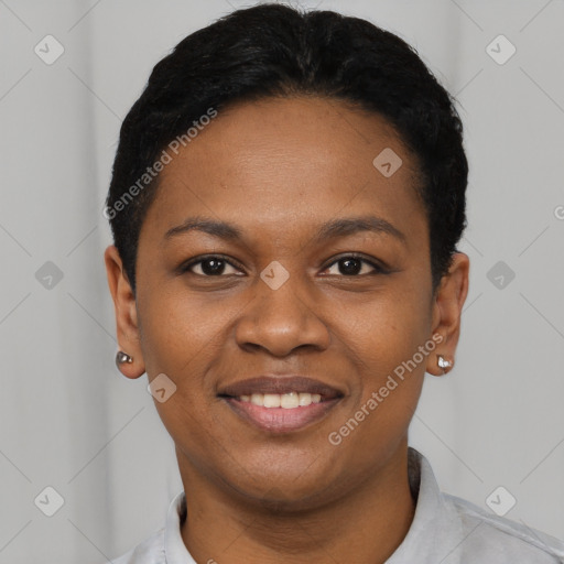 Joyful black young-adult female with short  black hair and brown eyes