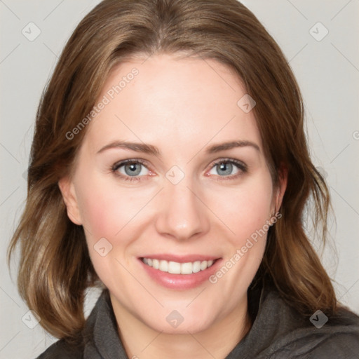 Joyful white young-adult female with medium  brown hair and blue eyes