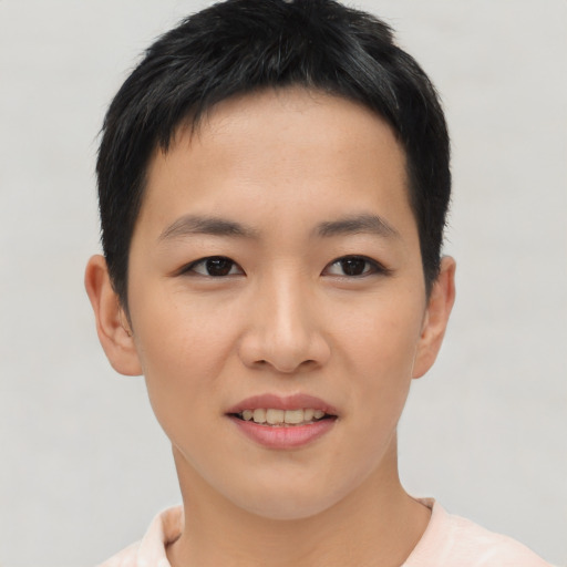 Joyful asian young-adult female with short  black hair and brown eyes