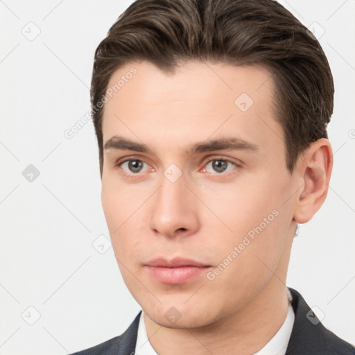 Neutral white young-adult male with short  brown hair and brown eyes