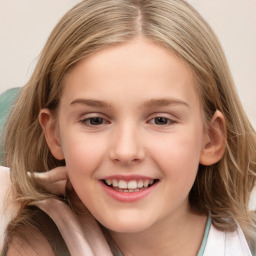 Joyful white child female with long  brown hair and brown eyes