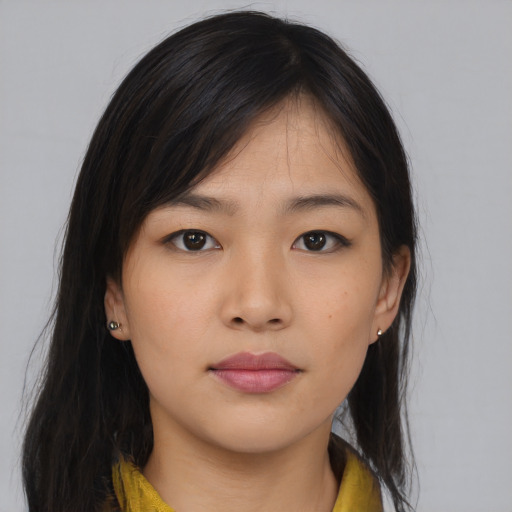 Neutral asian young-adult female with medium  brown hair and brown eyes