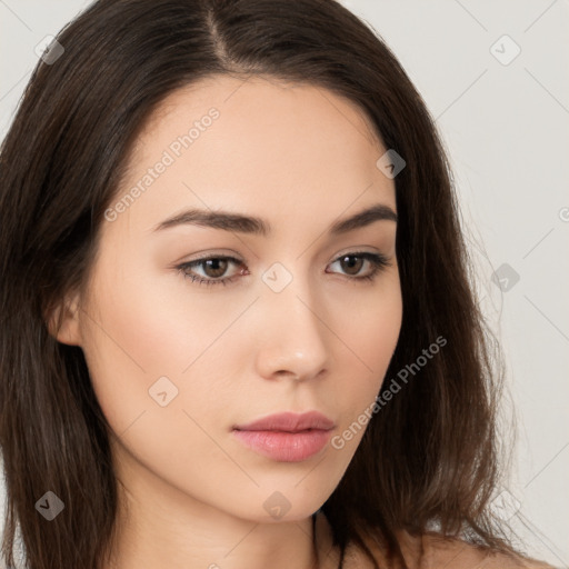 Neutral white young-adult female with long  brown hair and brown eyes