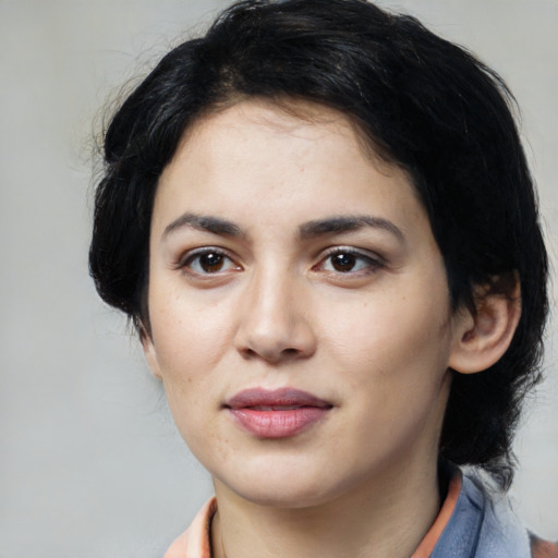 Joyful white young-adult female with medium  black hair and brown eyes