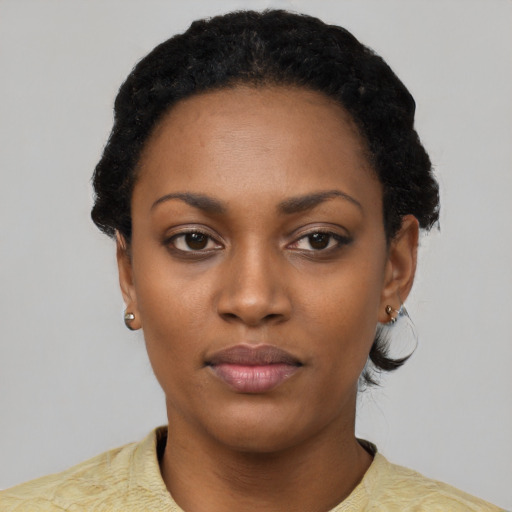 Neutral black young-adult female with short  black hair and brown eyes