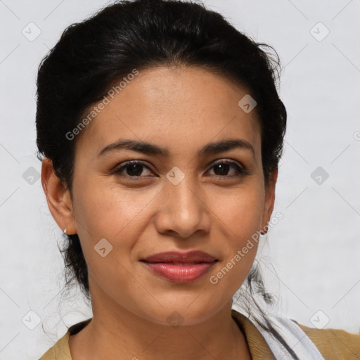 Joyful latino young-adult female with medium  brown hair and brown eyes