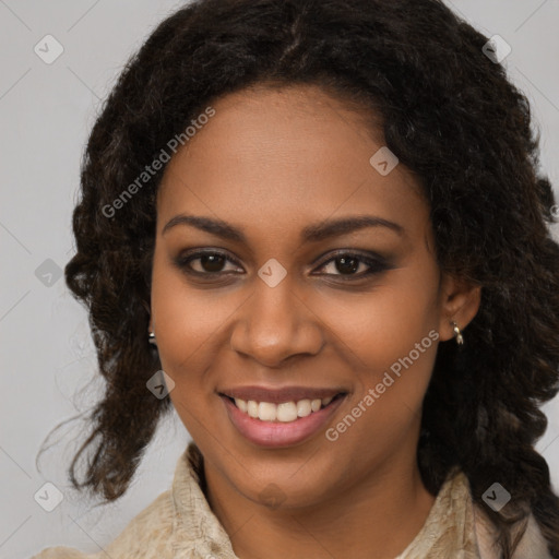 Joyful black young-adult female with long  brown hair and brown eyes