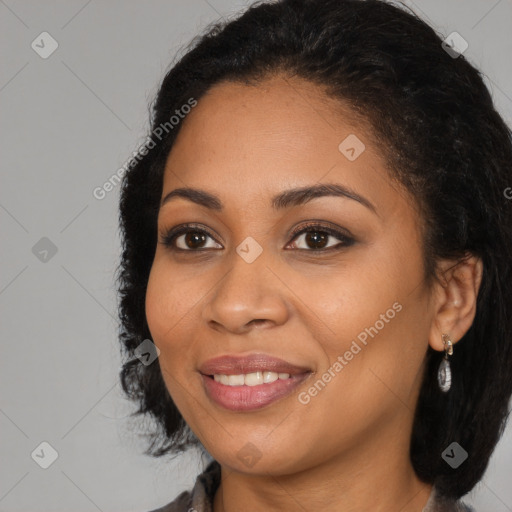 Joyful latino young-adult female with long  black hair and brown eyes