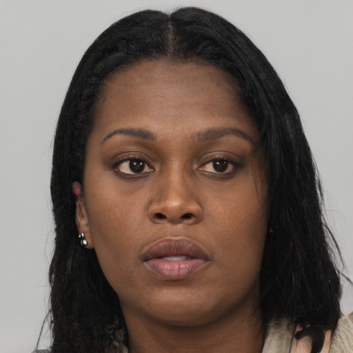 Neutral black young-adult female with long  black hair and brown eyes