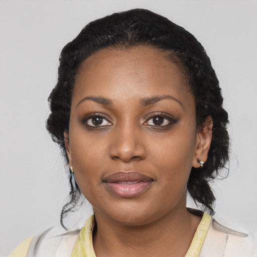 Neutral black young-adult female with medium  black hair and brown eyes