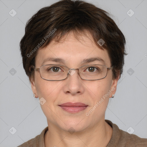 Joyful white adult female with short  brown hair and brown eyes