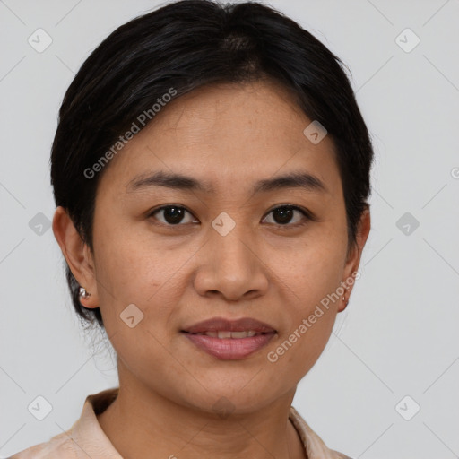 Joyful asian young-adult female with short  brown hair and brown eyes