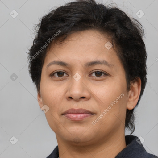 Joyful white adult female with short  brown hair and brown eyes