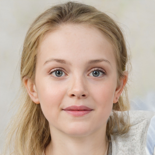 Joyful white child female with medium  brown hair and blue eyes