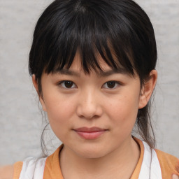 Joyful white child female with medium  brown hair and brown eyes