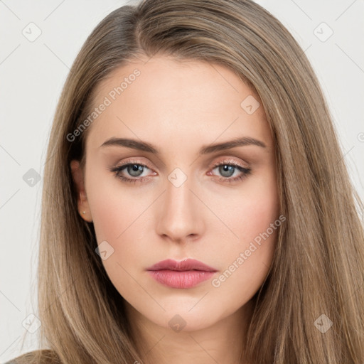 Neutral white young-adult female with long  brown hair and brown eyes