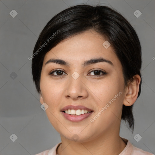 Joyful latino young-adult female with medium  black hair and brown eyes