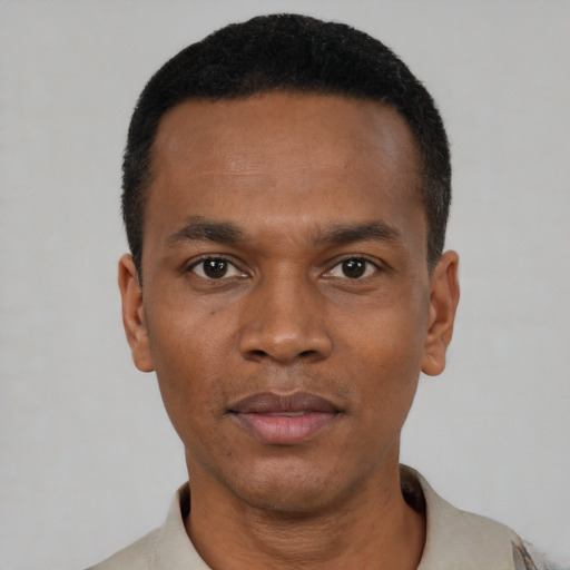 Neutral black young-adult male with short  black hair and brown eyes