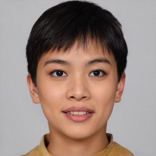 Joyful asian young-adult female with short  brown hair and brown eyes