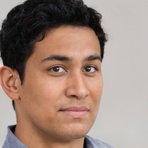 Neutral latino young-adult male with short  brown hair and brown eyes