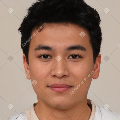 Joyful asian young-adult male with short  black hair and brown eyes