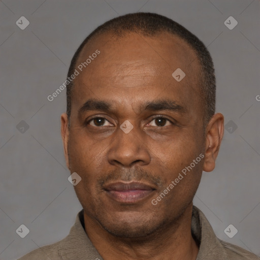 Neutral latino adult male with short  brown hair and brown eyes