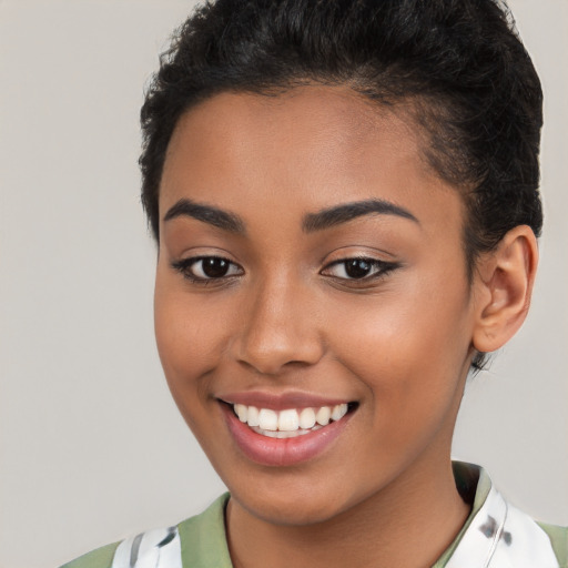 Joyful latino young-adult female with short  brown hair and brown eyes