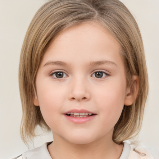 Joyful white child female with medium  brown hair and brown eyes