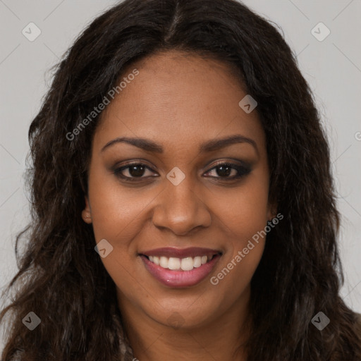 Joyful black young-adult female with long  brown hair and brown eyes