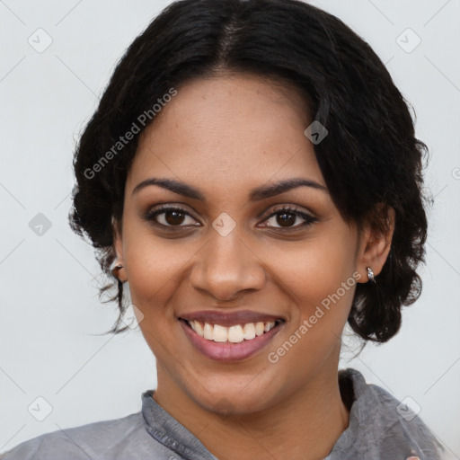 Joyful black young-adult female with medium  black hair and brown eyes