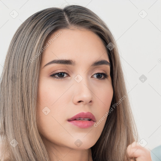 Neutral white young-adult female with long  brown hair and brown eyes