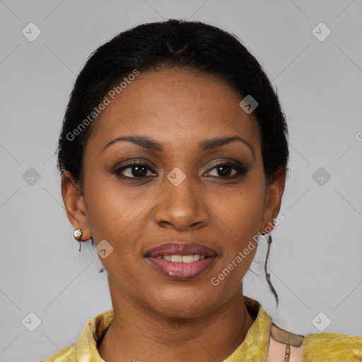 Joyful black young-adult female with short  black hair and brown eyes