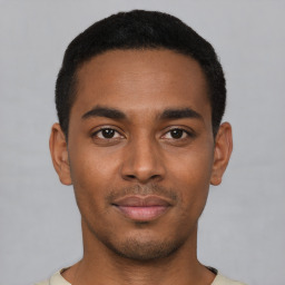 Neutral black young-adult male with short  black hair and brown eyes