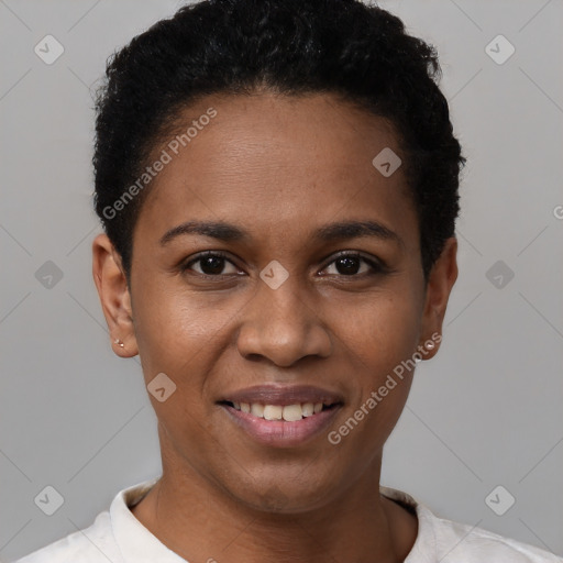 Joyful black young-adult female with short  black hair and brown eyes