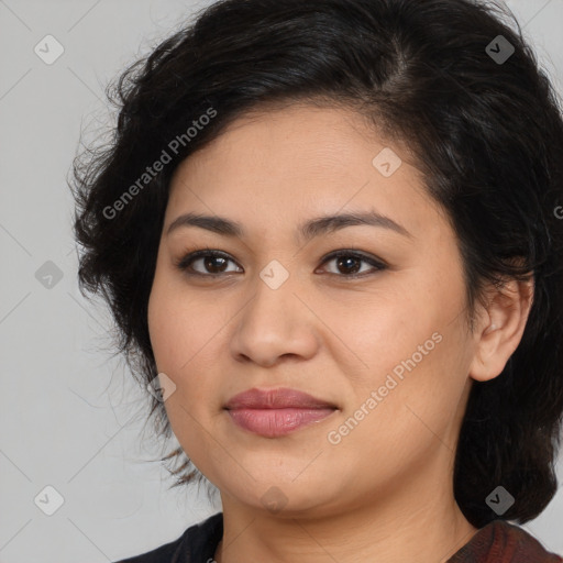 Joyful latino young-adult female with medium  brown hair and brown eyes