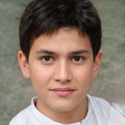 Joyful white child male with short  brown hair and brown eyes