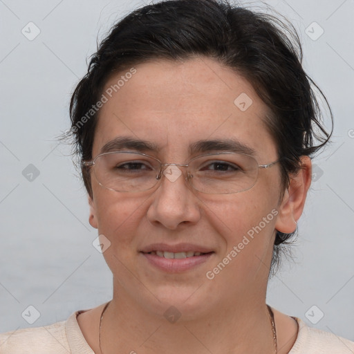 Joyful white adult female with short  brown hair and brown eyes