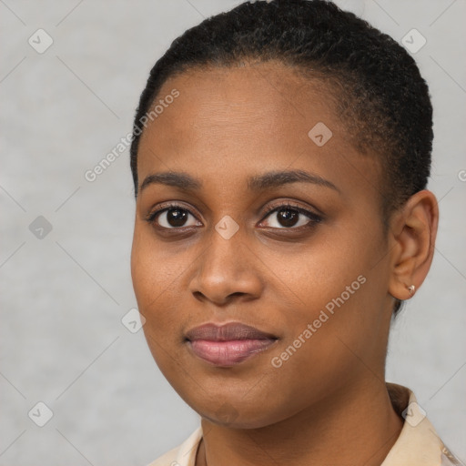 Joyful black young-adult female with short  brown hair and brown eyes