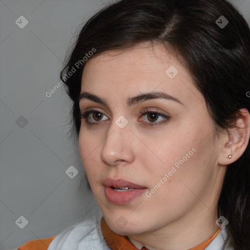 Neutral white young-adult female with medium  brown hair and brown eyes