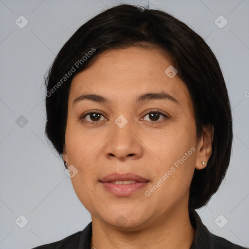 Joyful white adult female with medium  black hair and brown eyes