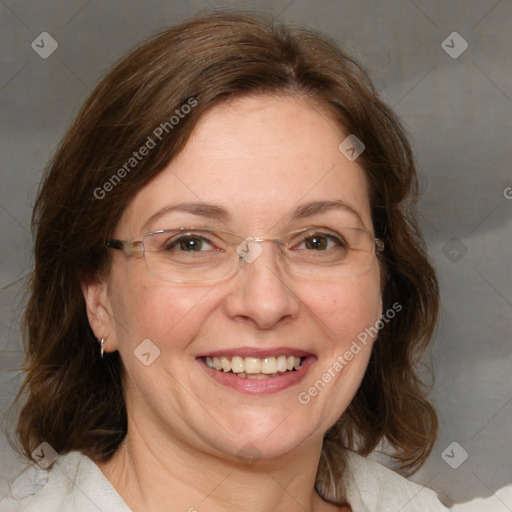 Joyful white adult female with medium  brown hair and blue eyes