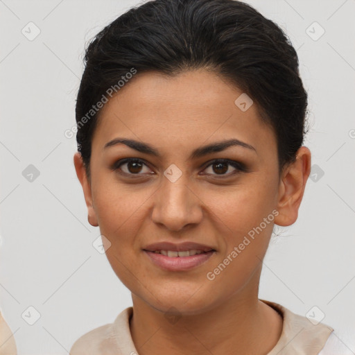 Joyful latino young-adult female with short  brown hair and brown eyes