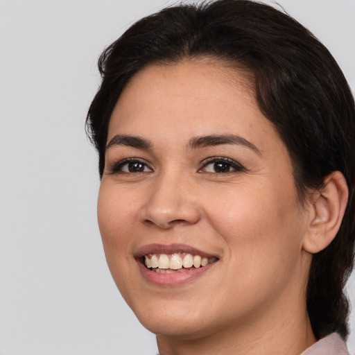 Joyful white young-adult female with medium  brown hair and brown eyes