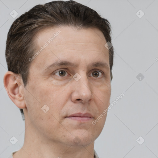 Neutral white adult male with short  brown hair and brown eyes