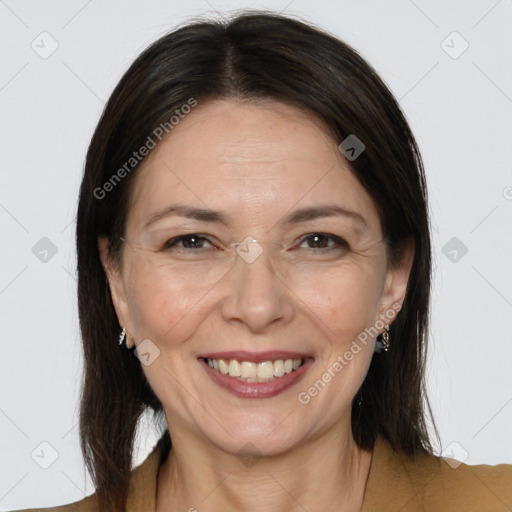 Joyful white adult female with medium  brown hair and brown eyes