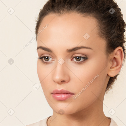 Neutral white young-adult female with long  brown hair and brown eyes